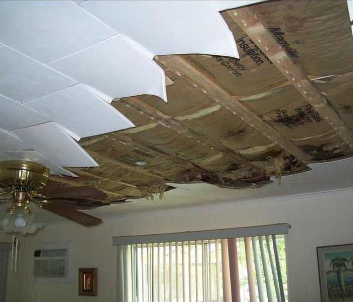 The ceiling and part of the roof tore off after a storm